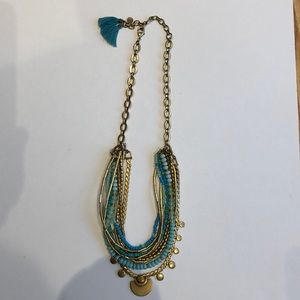 Stella and Dot necklace with turquoise color beads and brass metal